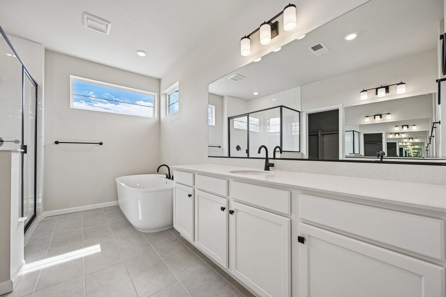 Furnished interior view inside a new home in The Aurora Highlands, Aurora (Image 8).
