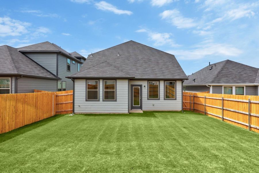 Exterior details and patio area of a home in Trinity Ranch, Elgin (Image 21). Exterior details and patio area of a home in Trinity Ranch, Elgin (Image 21).