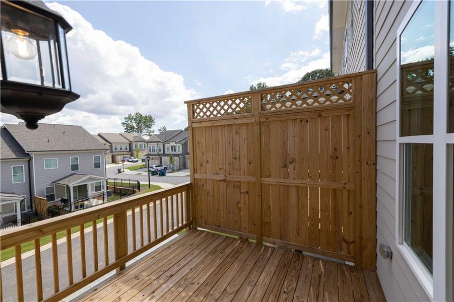 Exterior details and patio area of a home in Palisades Townhomes, Cumming (Image 4). Exterior details and patio area of a home in Palisades Townhomes, Cumming (Image 4).