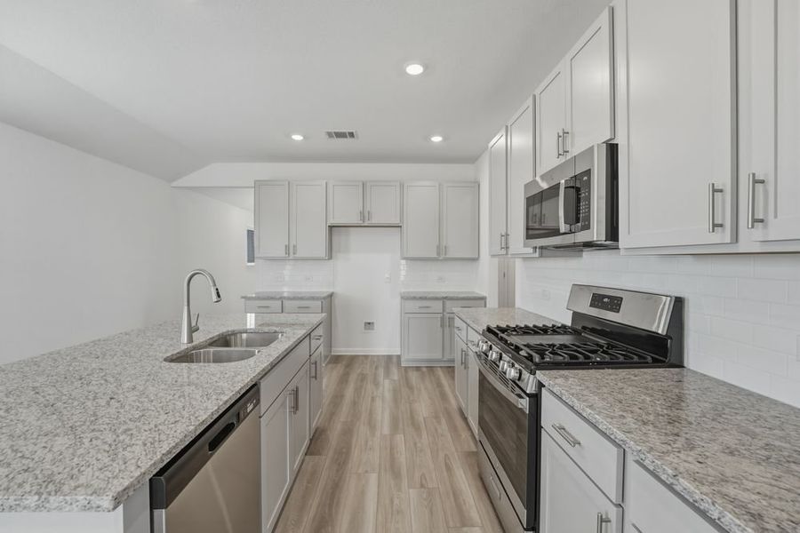 Furnished interior view inside a new home in Longview, Del Valle (Image 8).