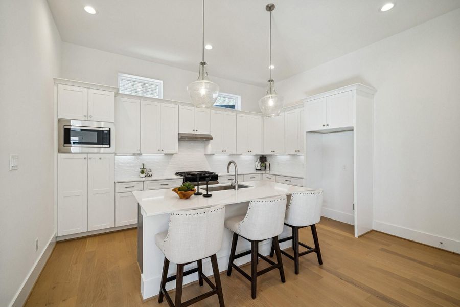 Furnished interior view inside a new home in West 21st Residences, Houston (Image 8).