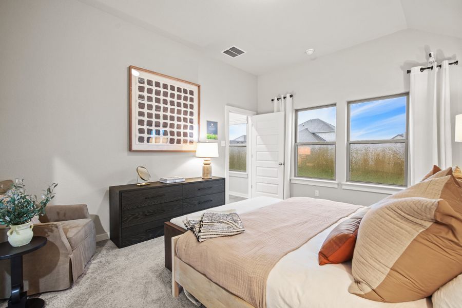 Primary Suite in the Diamond home plan by Trophy Signature Homes – REPRESENTATIVE PHOTO