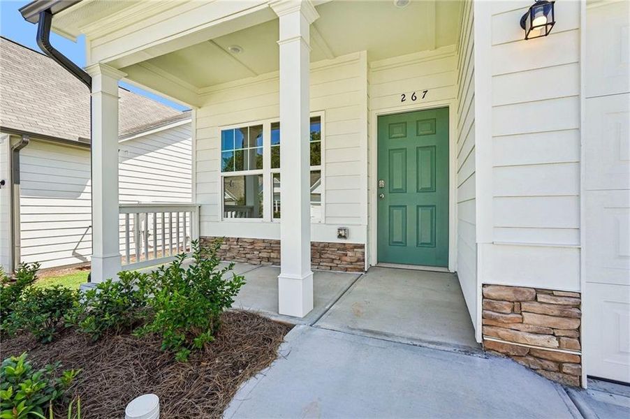 Exterior details and patio area of a home in Villages at Cedar Hill, Dallas (Image 27).