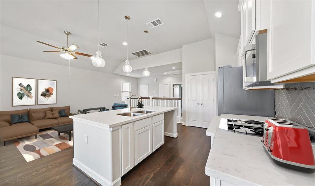 Kitchen overlooks great room (*Photo not of actual home and used for illustration purposes only.)