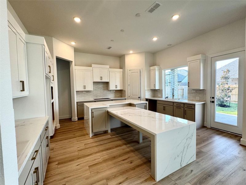 Style and Design in this Chef Kitchen -   Porcelain countertops a plus.