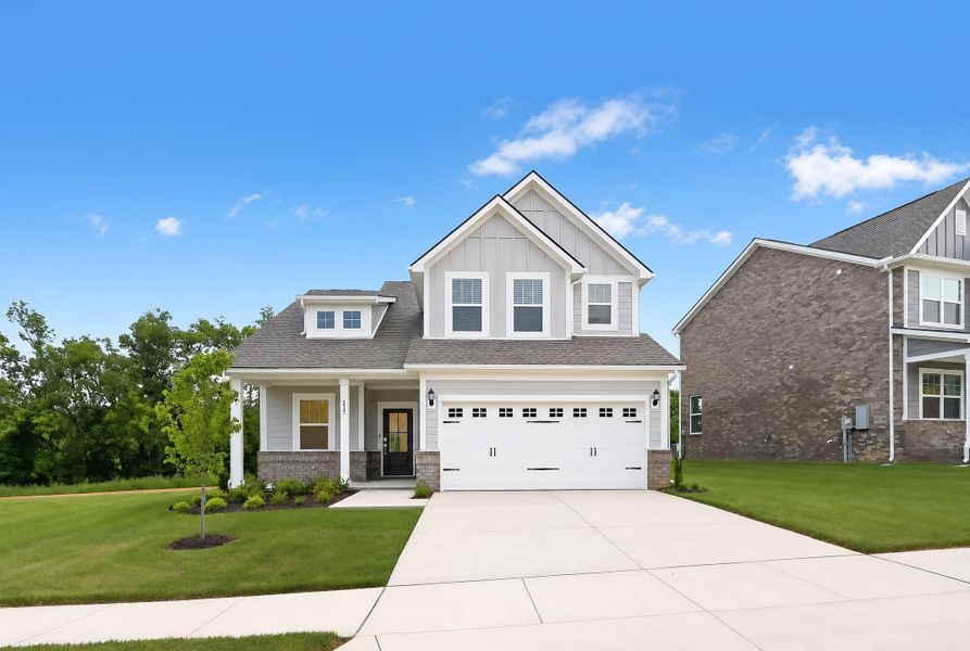 Front exterior of a new home in Avery Trace, Gallatin, TN, highlighting curb appeal (Image 1). Front exterior of a new home in Avery Trace, Gallatin, TN, highlighting curb appeal (Image 1).