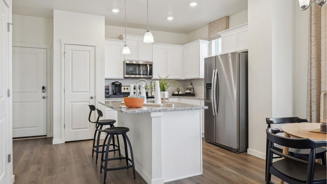 Furnished interior view inside a new home in Settlers Crossing, Commerce City (Image 8).
