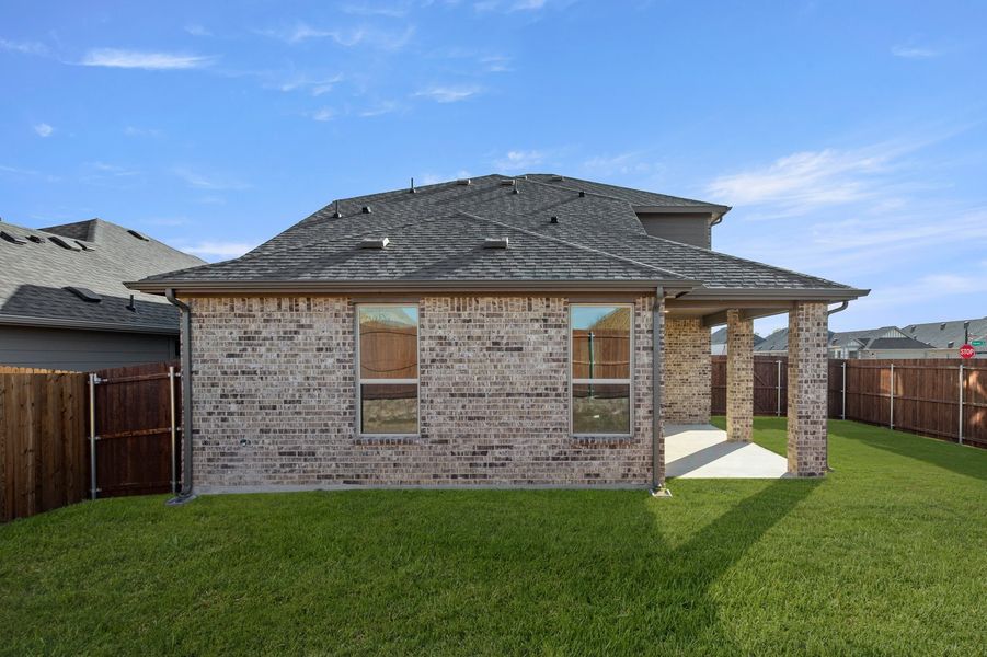 Front exterior of a new home in Keeneland, Aubrey, TX, highlighting curb appeal (Image 26). Front exterior of a new home in Keeneland, Aubrey, TX, highlighting curb appeal (Image 26).
