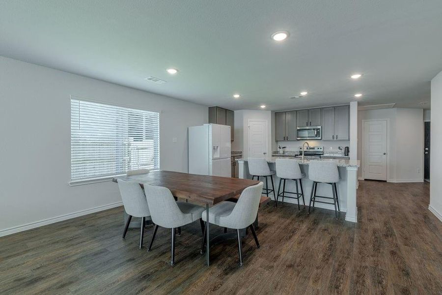 Great open-concept with luxury vinyl plank flooring and lots of light Great open-concept with luxury vinyl plank flooring and lots of light