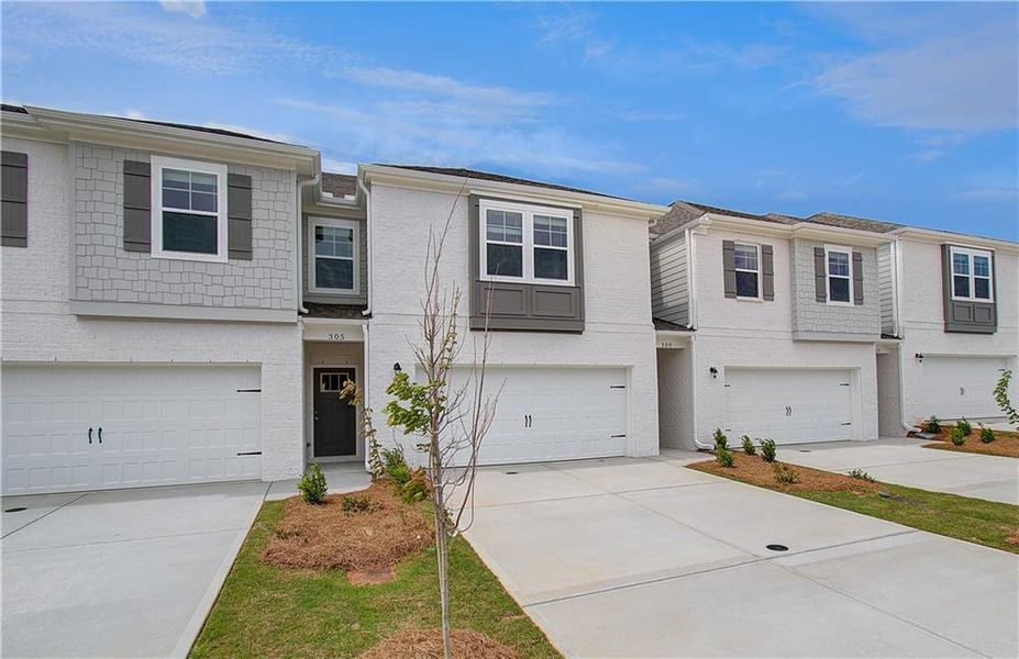 Front exterior of a new home in Bowers Farm, McDonough, GA, highlighting curb appeal (Image 2).
