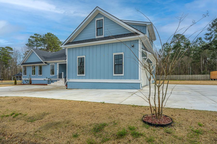 Front exterior of a new home in , Ladson, SC, highlighting curb appeal (Image 32). Front exterior of a new home in , Ladson, SC, highlighting curb appeal (Image 32).
