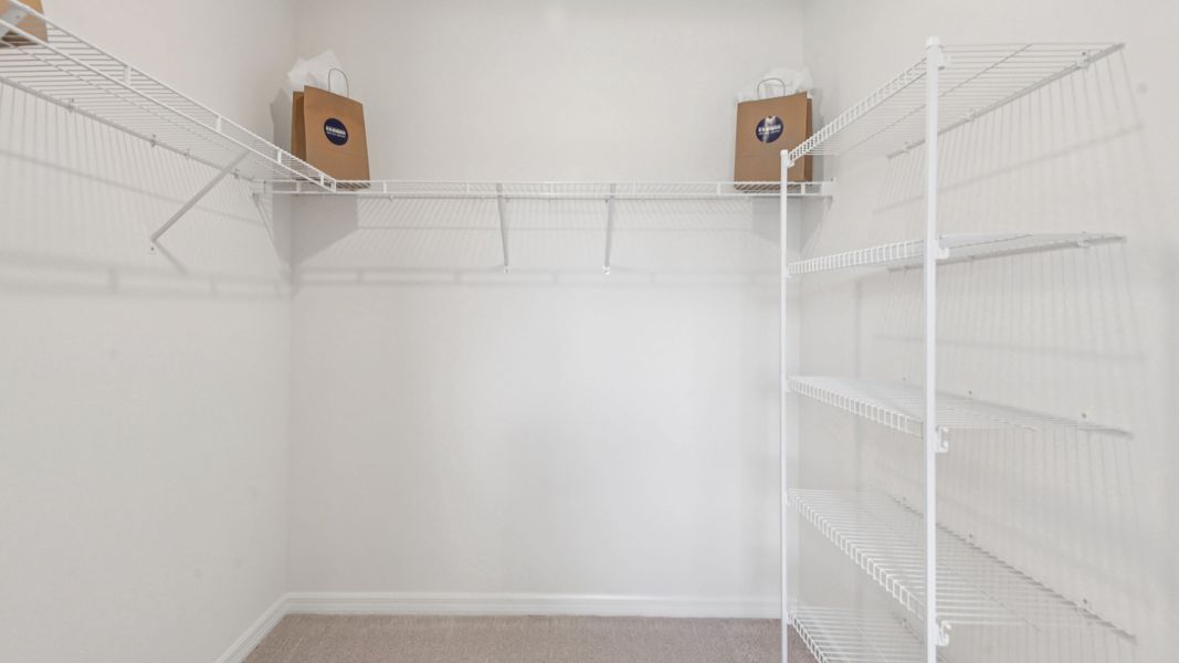 Representative unfurnished interior of a home built from the Coral by D.R. Horton in Briarwood, Alachua (Image 17).