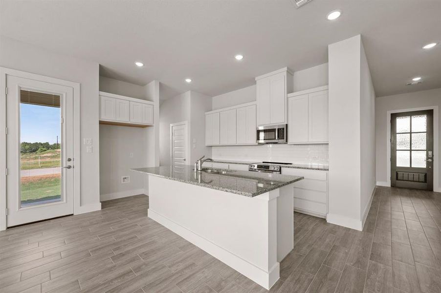 Furnished interior view inside a new home in Saddleback Estates, Boyd (Image 3). Furnished interior view inside a new home in Saddleback Estates, Boyd (Image 3).