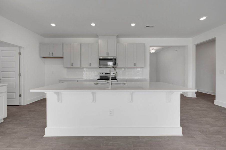 Furnished interior view inside a new home in McAlister Creek, Clayton (Image 7).