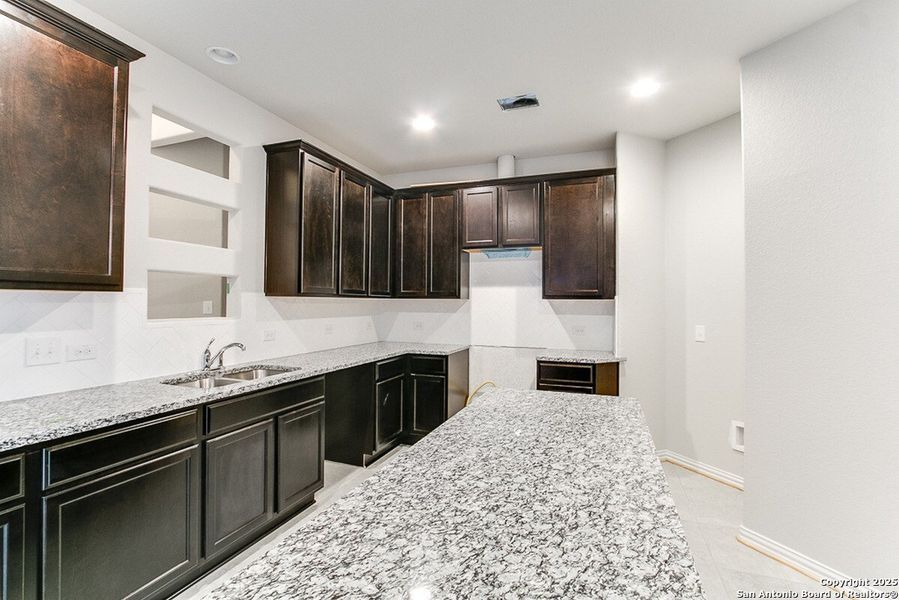 Furnished interior view inside a new home in Homestead, Schertz (Image 6).