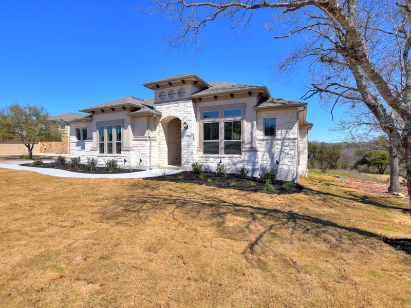 Representative exterior photo of a completed home built from the Siena III by Giddens Homes in Clearwater Ranch, Liberty Hill, TX (Image 35).