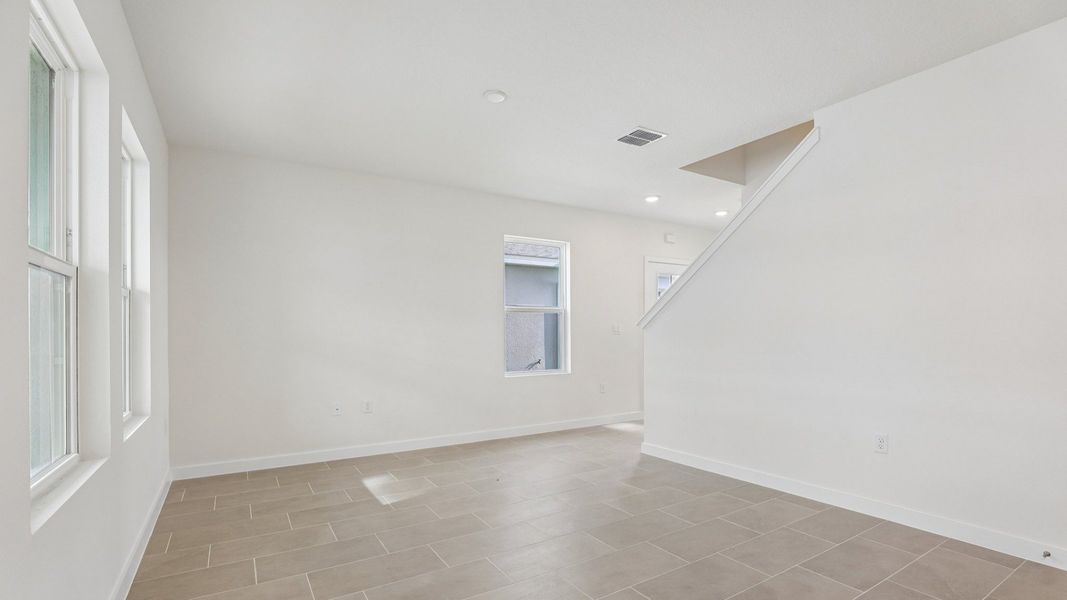 Furnished interior view inside a new home in Cyrene at Harmony, St. Cloud (Image 7).