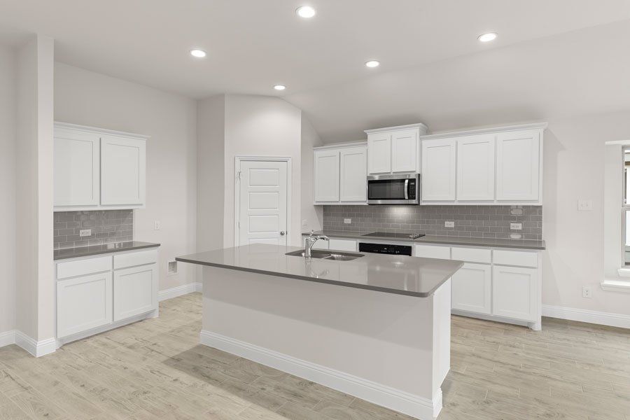 Representative exterior photo of a completed home built from the Kingston by Impression Homes in Timberbrook, Justin, TX (Image 7).