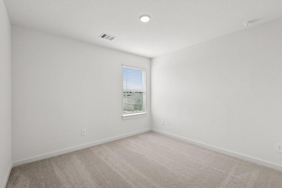 Spacious, unfurnished interior of a new home in Lone Star Landing, Montgomery (Image 40).
