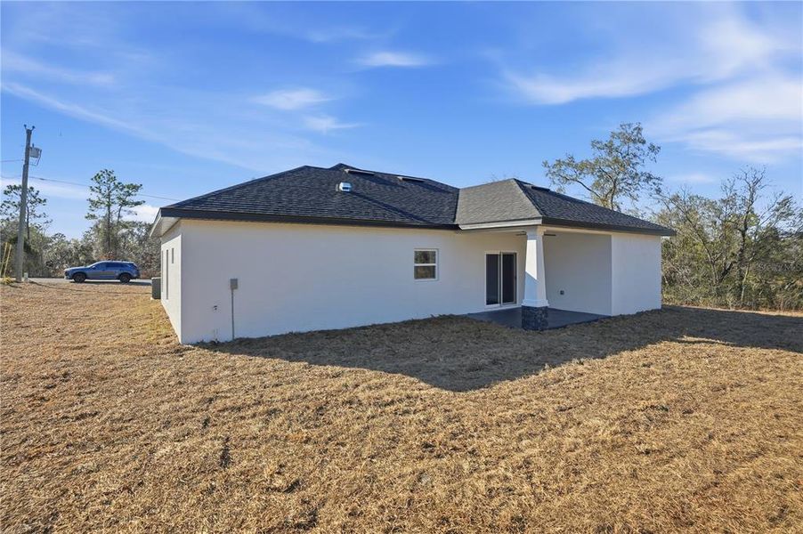 Exterior details and patio area of a home in , Brooksville (Image 3).