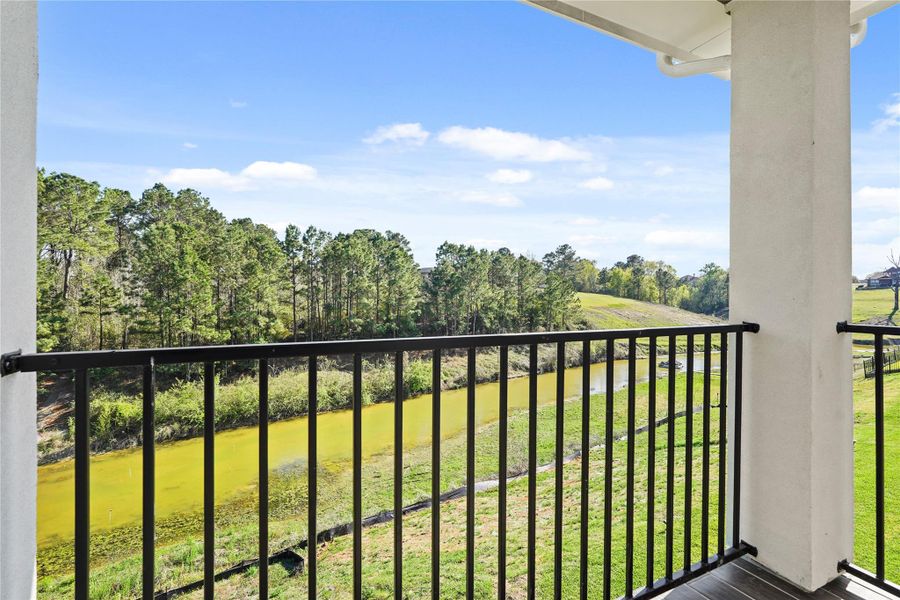 Exterior details and patio area of a home in Waterstone on Lake Conroe, Montgomery (Image 3).