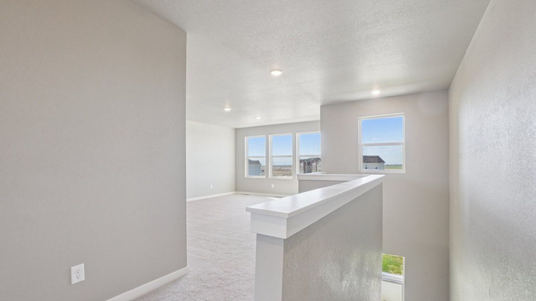 Furnished interior view inside a new home in Windler Townhomes, Aurora (Image 27).