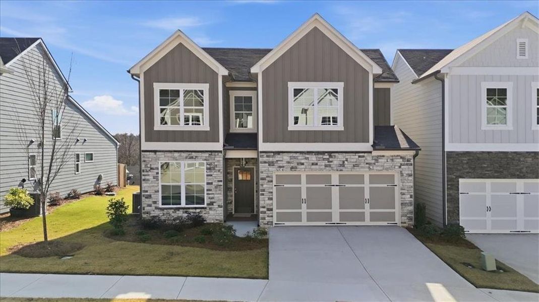 Front exterior of a new home in Lakeside at Great Sky, Canton, GA, highlighting curb appeal (Image 2).