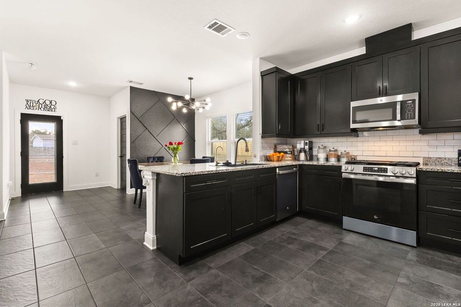 Furnished interior view inside a new home in , Elmendorf (Image 11).