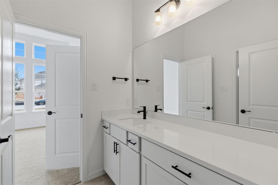 Furnished interior view inside a new home in Aldeana, Bonney (Image 18).