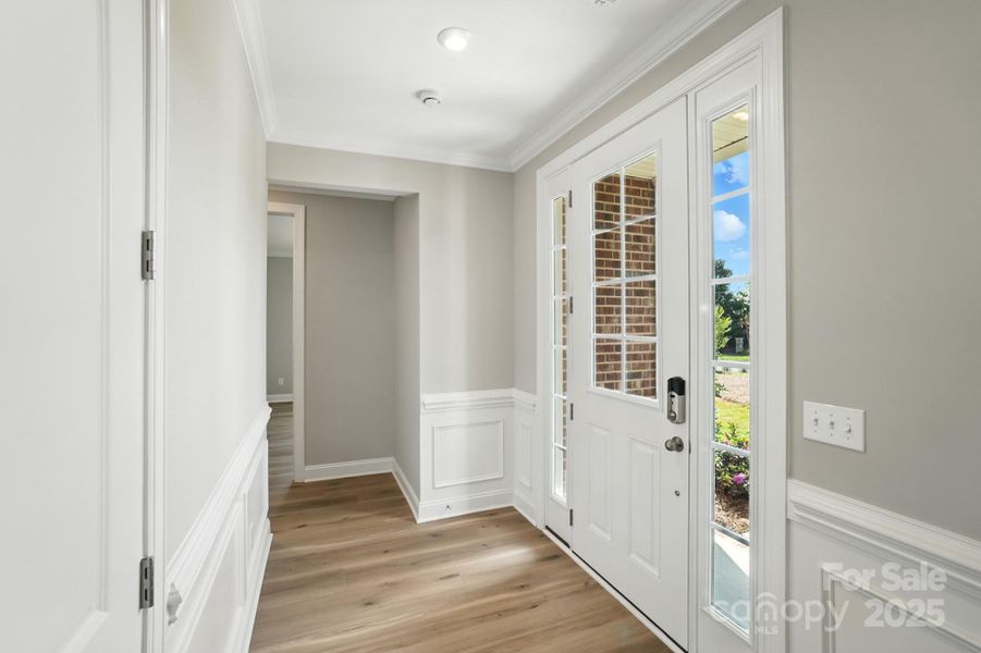 Foyer view to bedrooms- represented home has same interior options