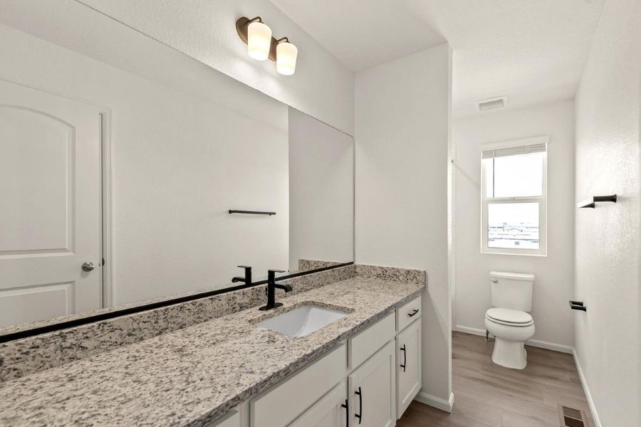 Furnished interior view inside a new home in Bennett Crossing Reserve, Bennett (Image 9).
