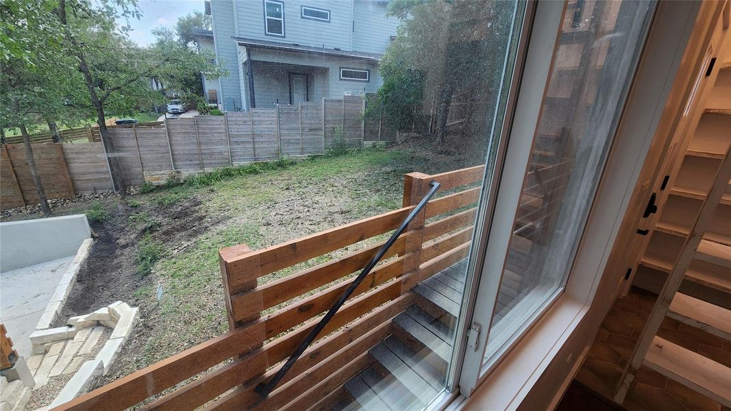 Yard from living room. Yard from living room.