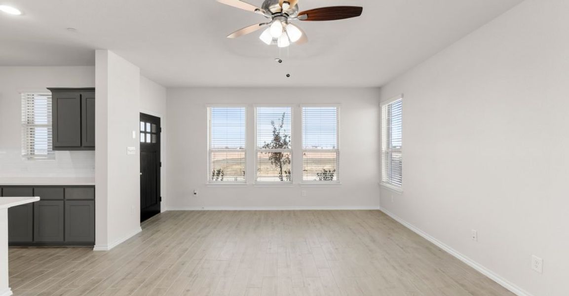 Representative exterior photo of a completed home built from the Caddo by Impression Homes in Creekshaw, Royse City, TX (Image 9).