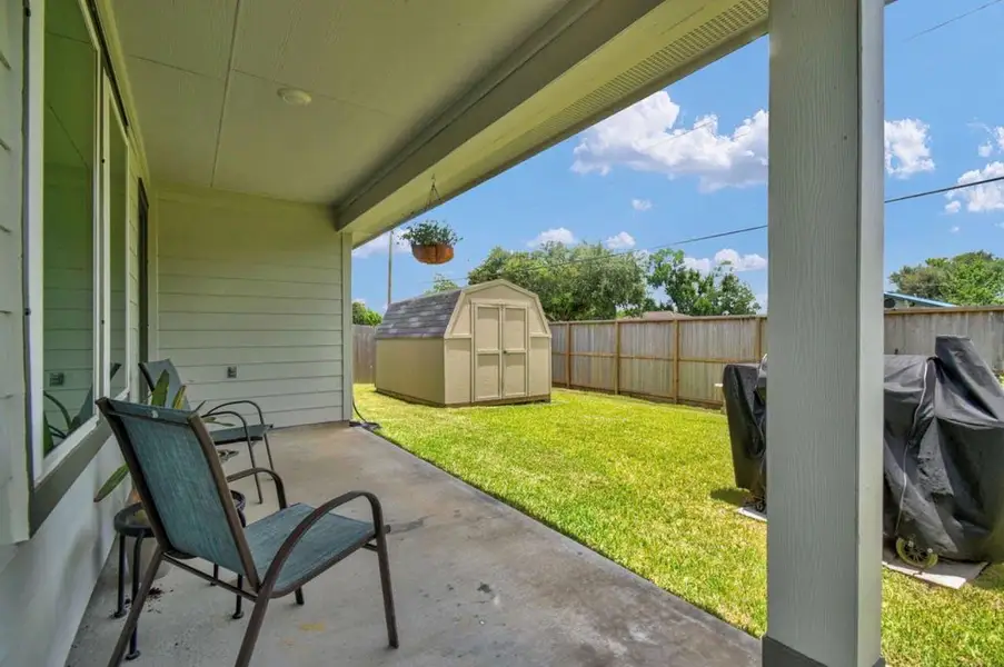 Exterior details and patio area of a home in Riverwood Ranch, Angleton (Image 22).