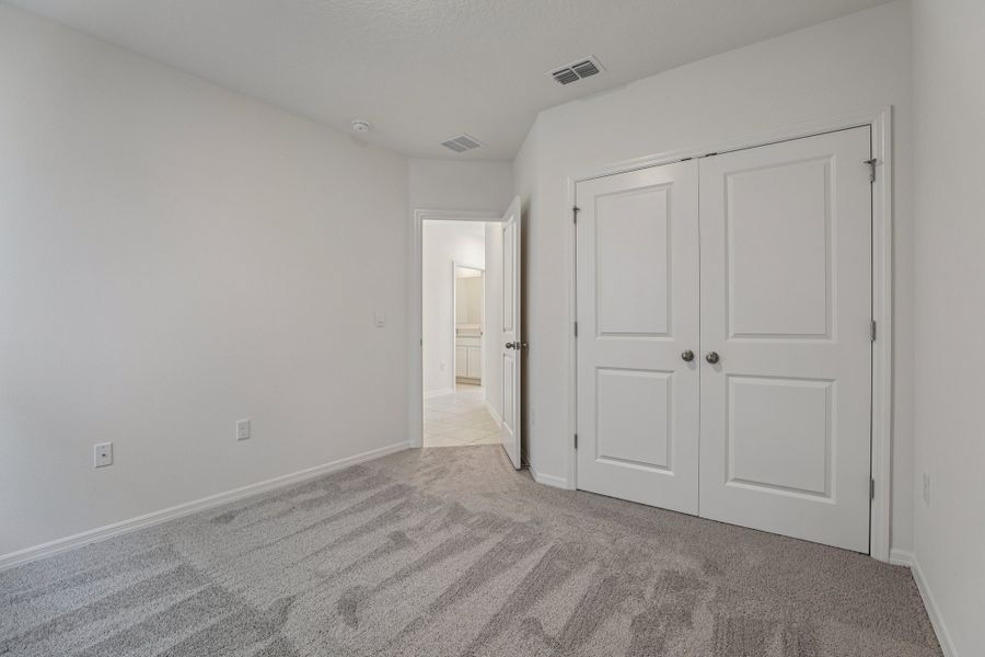 Representative unfurnished interior of a home built from the Vista by Maronda Homes in Heritage Station, Punta Gorda (Image 29).