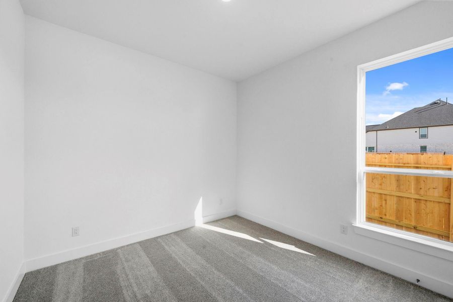 Designed with flexibility in mind, these generously-sized secondary bedrooms provide both comfort and functionality to fit your lifestyle. Designed with flexibility in mind, these generously-sized secondary bedrooms provide both comfort and functionality to fit your lifestyle.