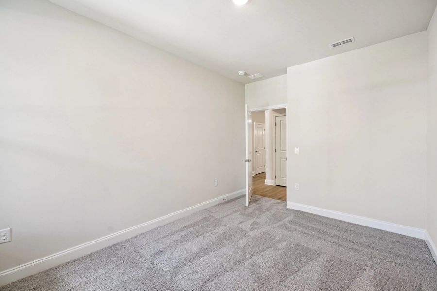 Spacious, unfurnished interior of a new home in Stewart's Glen | 55+ Community, Smyrna (Image 25).