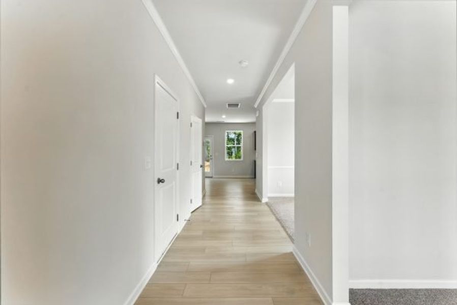 Representative unfurnished interior of a home built from the Brentwood by Piedmont Residential in Falls Creek, Flowery Branch (Image 12).