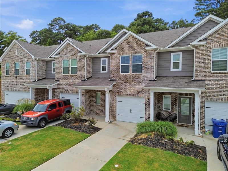 Front exterior of a new home in , Oakwood, GA, highlighting curb appeal (Image 28). Front exterior of a new home in , Oakwood, GA, highlighting curb appeal (Image 28).