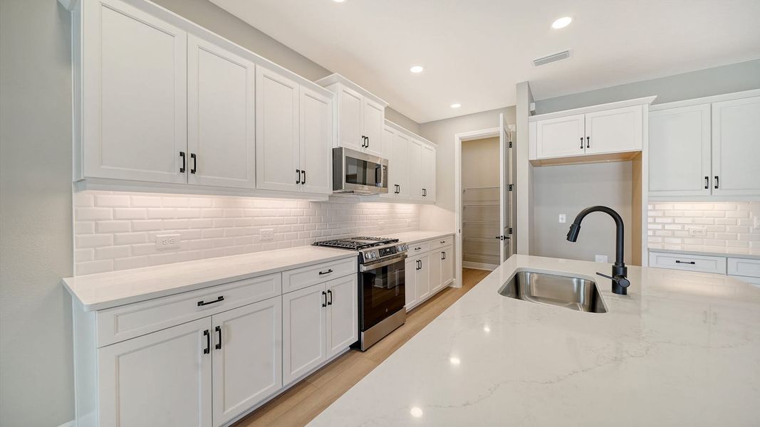 Furnished interior view inside a new home in Windward Real Estate and Homes for Sale in Sarasota, FL - Neal Communities, Lakewood Ranch (Image 8).
