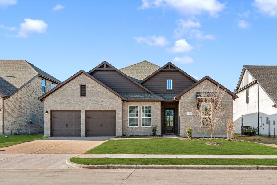 Representative exterior photo of a completed home built from the Hawkins by UnionMain Homes in Lake Breeze, Lavon, TX (Image 19). Representative exterior photo of a completed home built from the Hawkins by UnionMain Homes in Lake Breeze, Lavon, TX (Image 19).