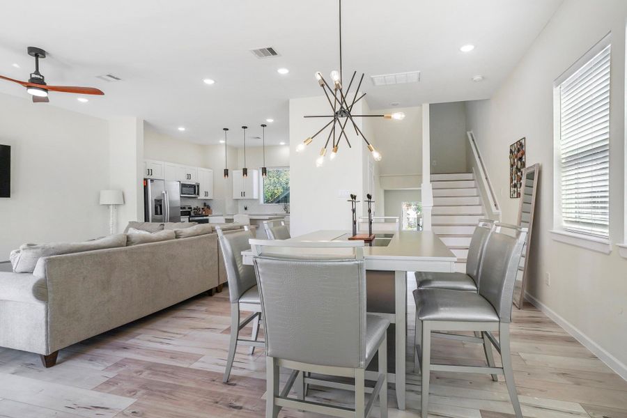 There is a half bath on the second story of this modern home.
