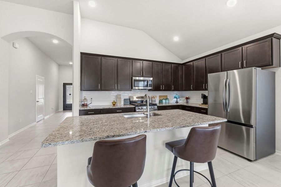 Gather, entertain, and create memories in this stunning chef-inspired kitchen with oversized island seating and elegant finishes throughout. Gather, entertain, and create memories in this stunning chef-inspired kitchen with oversized island seating and elegant finishes throughout.