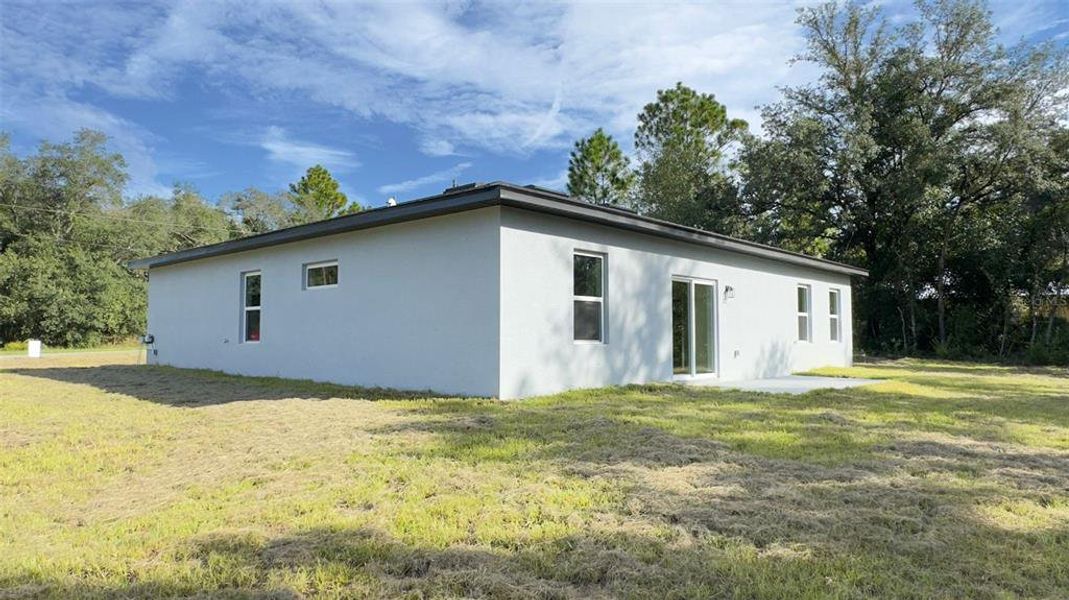Front exterior of a new home in , Dunnellon, FL, highlighting curb appeal (Image 21).