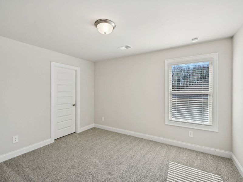 Spacious, unfurnished interior of a new home in Martin Springs - Cottage Series, Lawrenceville (Image 17).