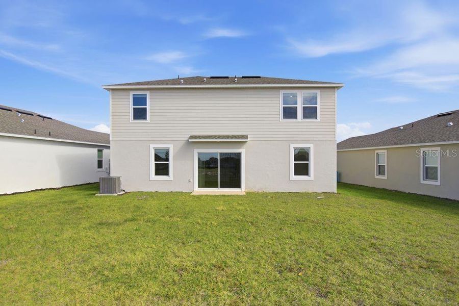 Exterior details and patio area of a home in Waterstone, Groveland (Image 3). Exterior details and patio area of a home in Waterstone, Groveland (Image 3).