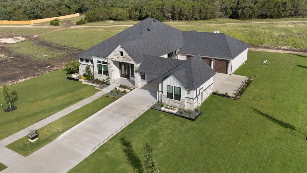 Front exterior of a home in the Feathergrass community, located in Florence, TX (Image 13).