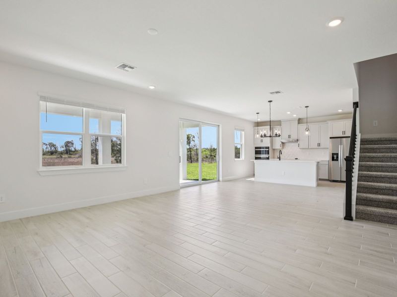 Spacious, unfurnished interior of a new home in Magnolia Bay - Reserve Series, Nokomis (Image 8).