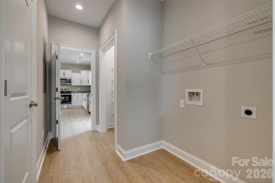 Representative photo of same build. Layout reversed per attached floorplan. Colors and selections may differ.