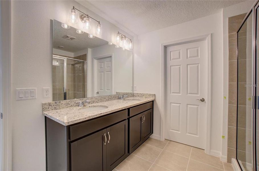 Furnished interior view inside a new home in Groves at Grand Island, Grand Island (Image 2).